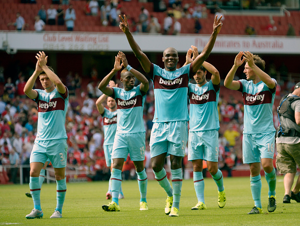West Ham players celebrating their win over Arsenal