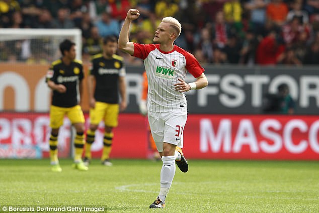 Augsburg left-back Philipp Max celebrates after scoring. (Getty Images)