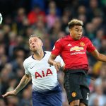 Tottenham's Toby Alderweireld challenges for the ball in the air with Manchester United's Jesse Lingard. (Getty Images)