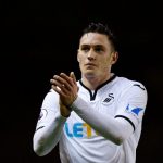 Swansea City defender Connor Roberts applauds the fans after the game. (Getty Images)