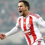 Olympiacos right-back Omar Elabdellaoui celebrates after scoring. (Getty Images)
