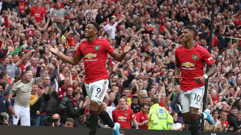 Anthony Martial and Marcus Rashford celebrate against Chelsea. (Getty Images)
