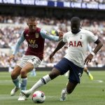 Tottenham midfielder Tanguy NDombele dribbles past Aston Villa's Conor Hourihane. (Getty Images)