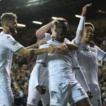 Leeds United players celebrate after scoring. (Getty Images)