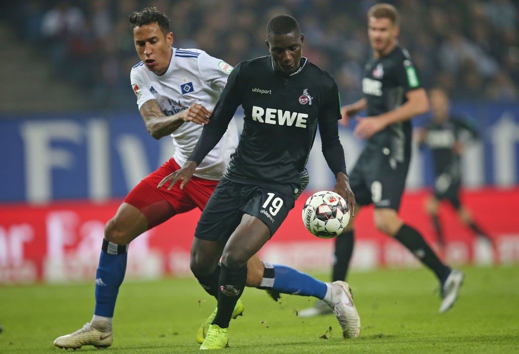 (L-R) Leo Lacroix of Hamburger SV and Serhou Guirassy of 1. FC Koeln battle for the ball during the Second Bundesliga match between Hamburger SV and 1. FC Koeln at Volksparkstadion on November 5, 2018 in Hamburg, Germany. (Photo by Cathrin Mueller/Bongarts/Getty Images)