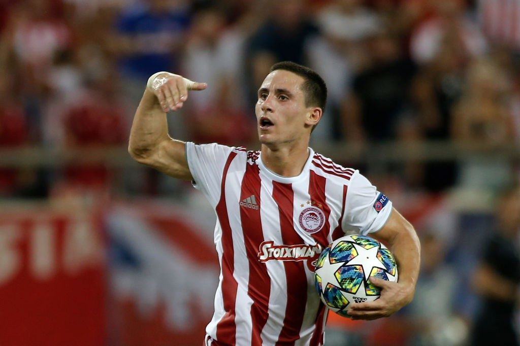 Olympiakos winger Daniel Podence celebrates after scoring against Tottenham in the Champions League. (Getty Images)