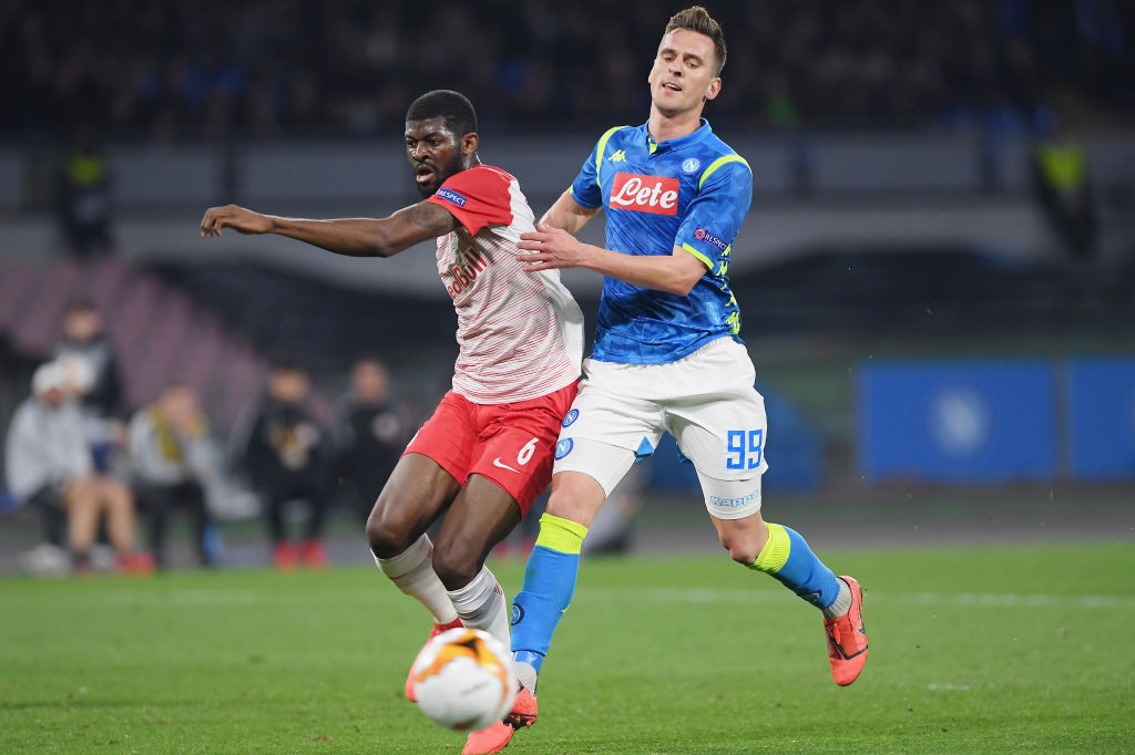 Jerome Onguene of Red Bull Salzburg vies Arkadiusz Milik of SSC Napoli during the UEFA Europa League Round of 16 First Leg match between S.S.C. Napoli and Red Bull Salzburg at Stadio San Paolo on March 7, 2019 in Naples, Italy. (Getty Images)