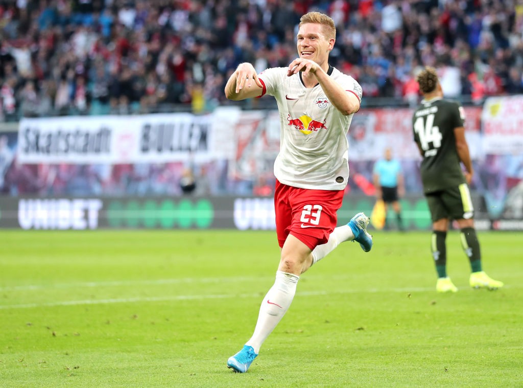 Marcel Halstenberg of RB Leipzig celebrates after scoring his team's fourth goal during the Bundesliga match between RB Leipzig and 1. FSV Mainz 05 at Red Bull Arena on November 02, 2019 in Leipzig, Germany. (Getty Images)