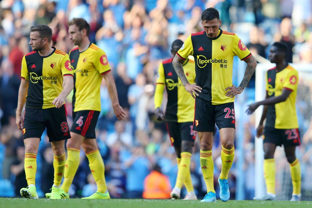 Watford players look dejected after their 8-0 defeat in the Premier League match between Manchester City and Watford FC at Etihad Stadium. (Getty Images)