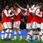 Arsenal players celebrate after scoring. (Getty Images)