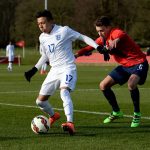 Ian Carlo Poveda of England U16 holds off a challenge from Erik Tobias Sandberg of Norway U16 during the U16s International Friendly match between England U16 and Norway U16 at St Georges Park on February 16, 2016 in Burton-upon-Trent, England. (Getty Images)