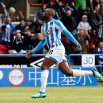Isaac Mbenza of Huddersfield Town celebrates as he scores his team's first goal during the Premier League match between Huddersfield Town and Manchester United at John Smith's Stadium on May 05, 2019 in Huddersfield, United Kingdom. (Getty Images)