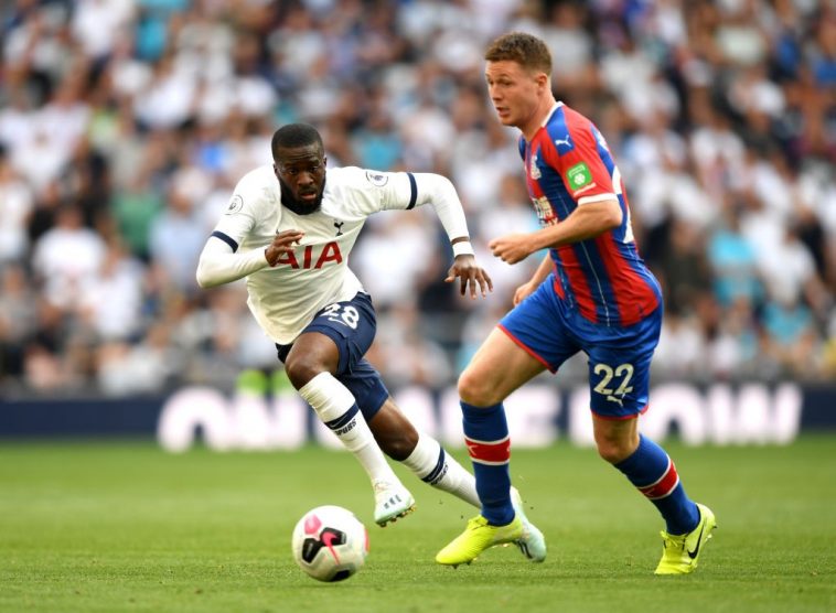 Tanguy Ndombele of Tottenham Hotspur chases down James McCarthy of Crystal Palace during the Premier League match between Tottenham Hotspur and Crystal Palace at Tottenham Hotspur Stadium on September 14, 2019 in London. (Getty Images)
