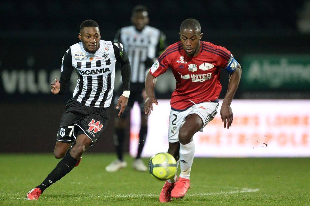 Amiens' French defender Prince-De Gouano (R) vies with Angers' Cameroonian forward Karl Toko Ekambi (L) during the French L1 football match between Angers (SCO) and Amiens (Amiens SC), on January 27, 2018, in Raymond-Kopa Stadium, in Angers. (Getty Images)