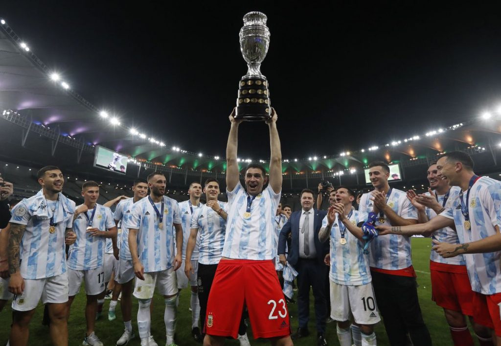 Martinez with the Copa America 2020 title. (AP Photo/Bruna Prado)