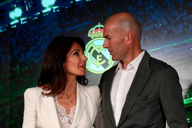 Zinedine Zidane with his wife, Veronique Zidane. (Photo by PIERRE-PHILIPPE MARCOU / AFP)
