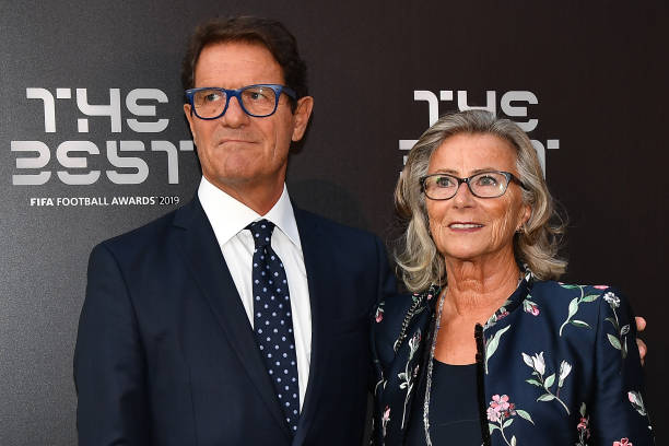 Italian coach Fabio Capello (L) and his wife Laura Ghisi arrive for The Best FIFA Football Awards ceremony. 