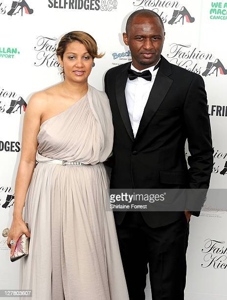 Patrick Vieira and wife Cheryl Vieira at a fashion show. (Photo by Shirlaine Forrest/WireImage)