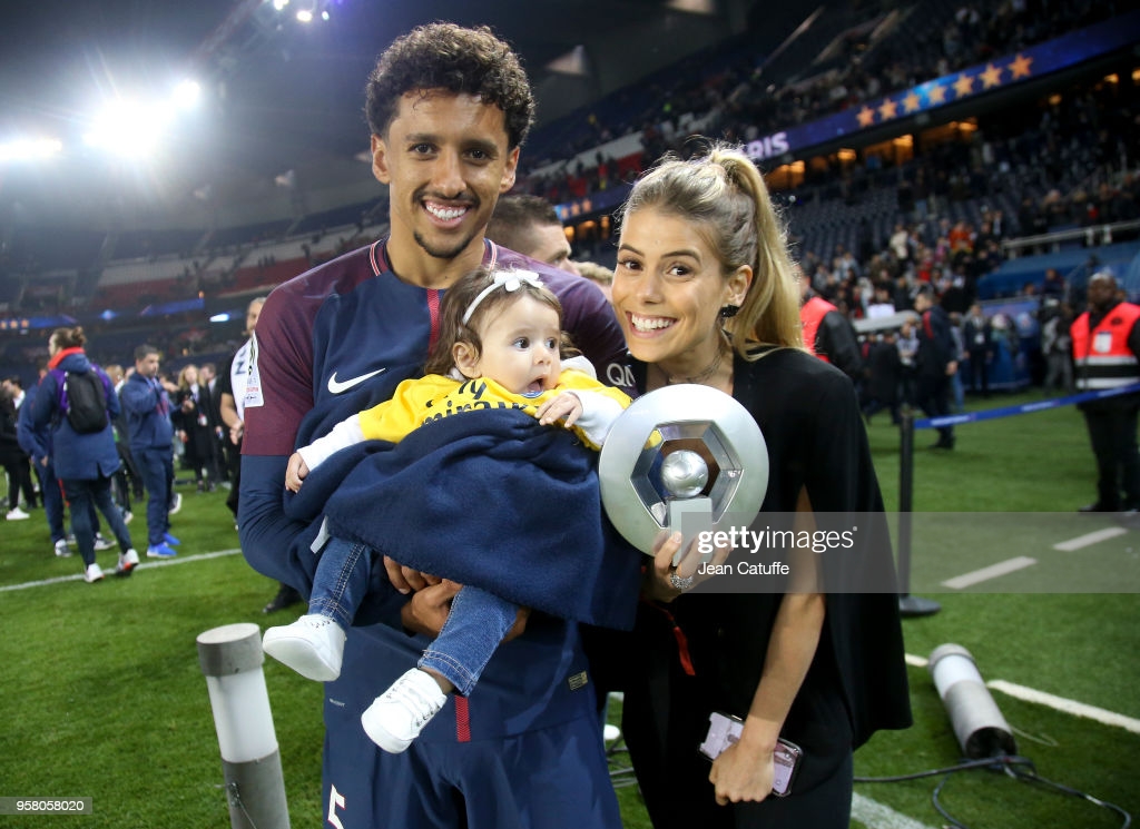 Marquinhos of PSG, his wife Carol Cabrino and their daughter Maria Eduarda Cabrino Correa during the French Ligue 1 Championship Trophy Ceremony. (Photo by Jean Catuffe/Getty Images)