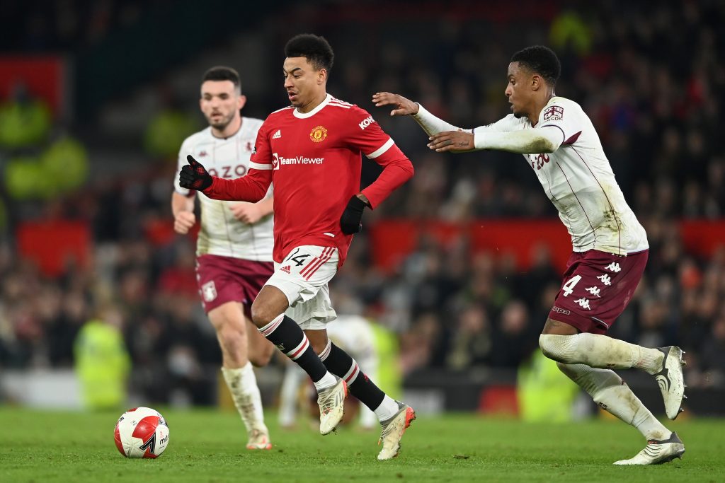 Ezri Konsa of Aston Villa and Jesse Lingard of Manchester United compete for the ball during the Emirates FA Cup match. (Photo by Gareth Copley/Getty Images)