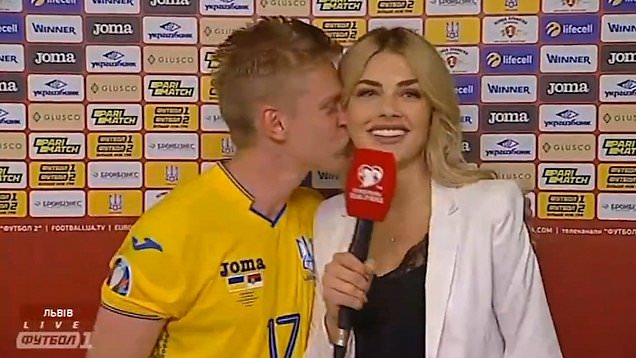 Oleksandr Zinchenko kissed his wife during a live interview. (Credit: dailymail.co.uk)