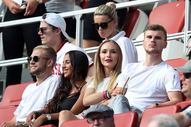 Werner and his girlfriend, Julia Nagler (Second from right) watch from the stands.