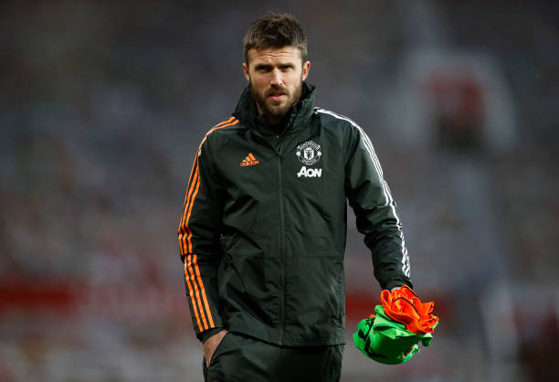 Michael Carrick, Manchester United assistant coach looks on prior to the Premier League match between Manchester United and Arsenal at Old Trafford 