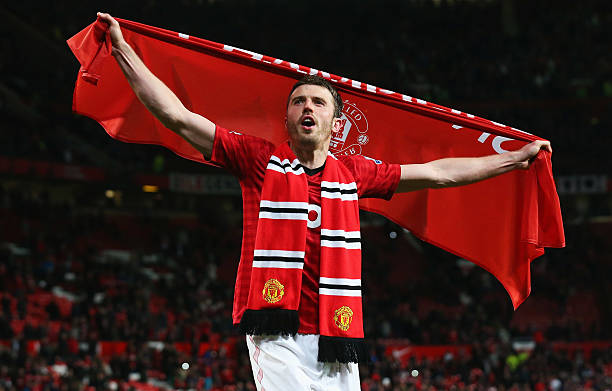 Michael Carrick of Manchester United celebrates victory and winning the Premier League title
