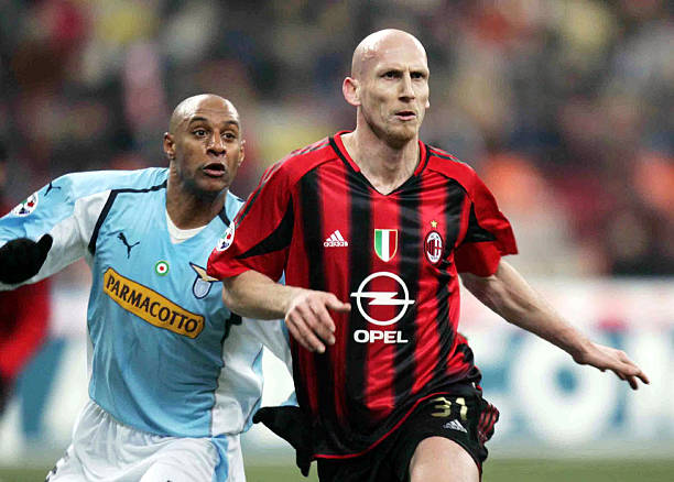  Ousmane Dabo of Lazio struggles for control of the ball against Jaap Stam of AC Milan during the Italian Serie A football match at San Siro 