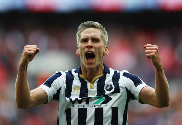  Steve Morison of Millwall celebrates victory and promotion after the Sky Bet League One Playoff Final between Bradford City and Millwall at Wembley Stadium on May 20, 2017 in London, England.