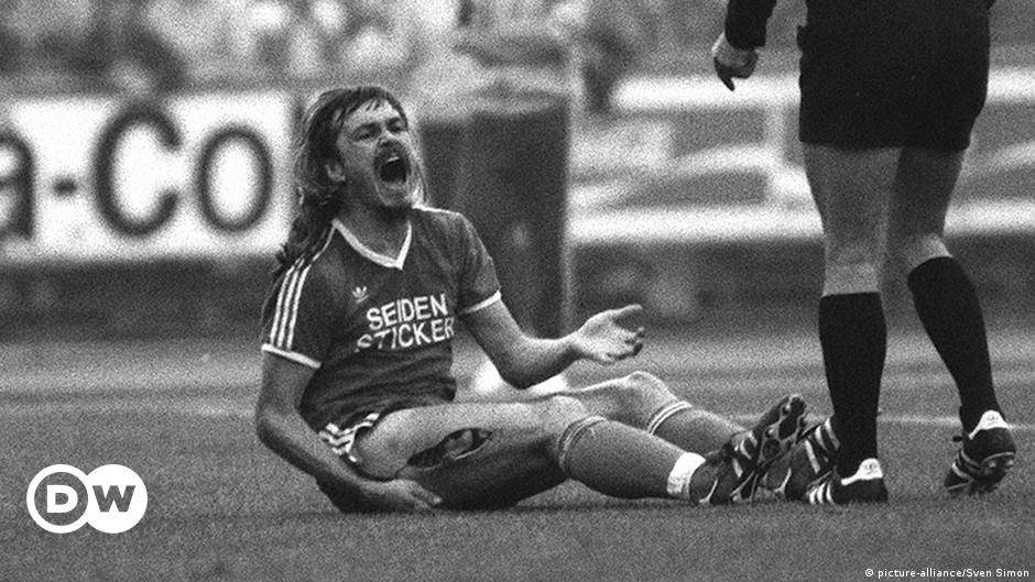 Ewald Lienen after suffering an open would of 20 cm during the 