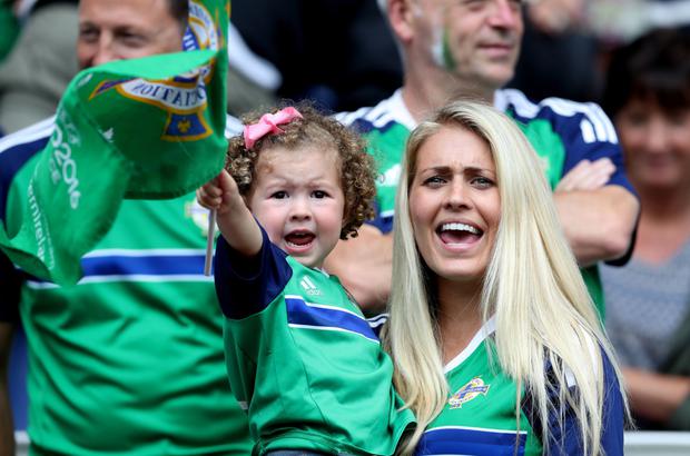 Helen McConnell with her daughter. (Credit: belfasttelegraph.co.uk)