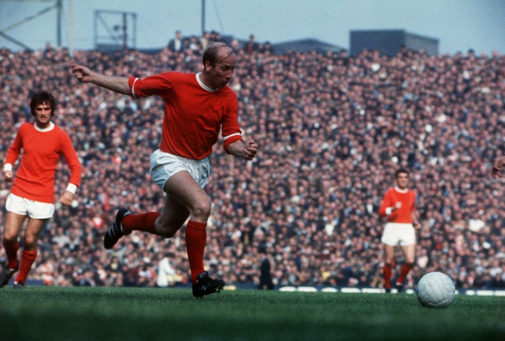 Sir Bobby Charlton advancing with the ball. (Picture was taken from manchestereveningnews.co.uk)