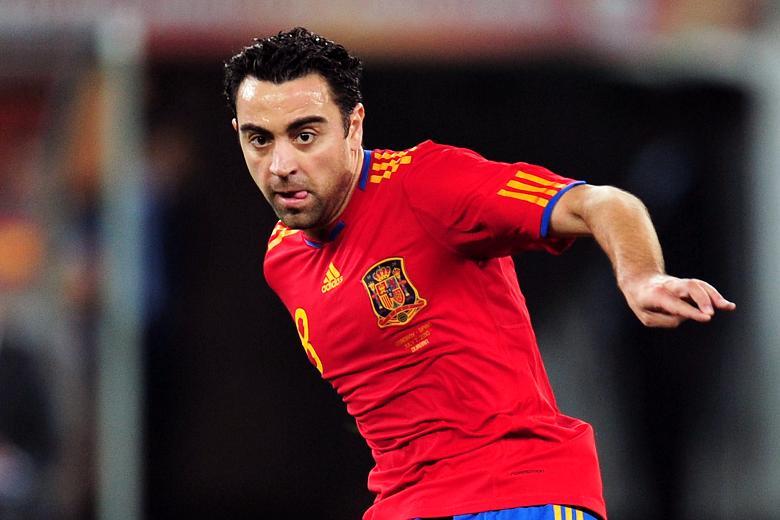 Xavi Hernandez had world class control and passing abilities. (Credit: MASON/GETTY IMAGES)