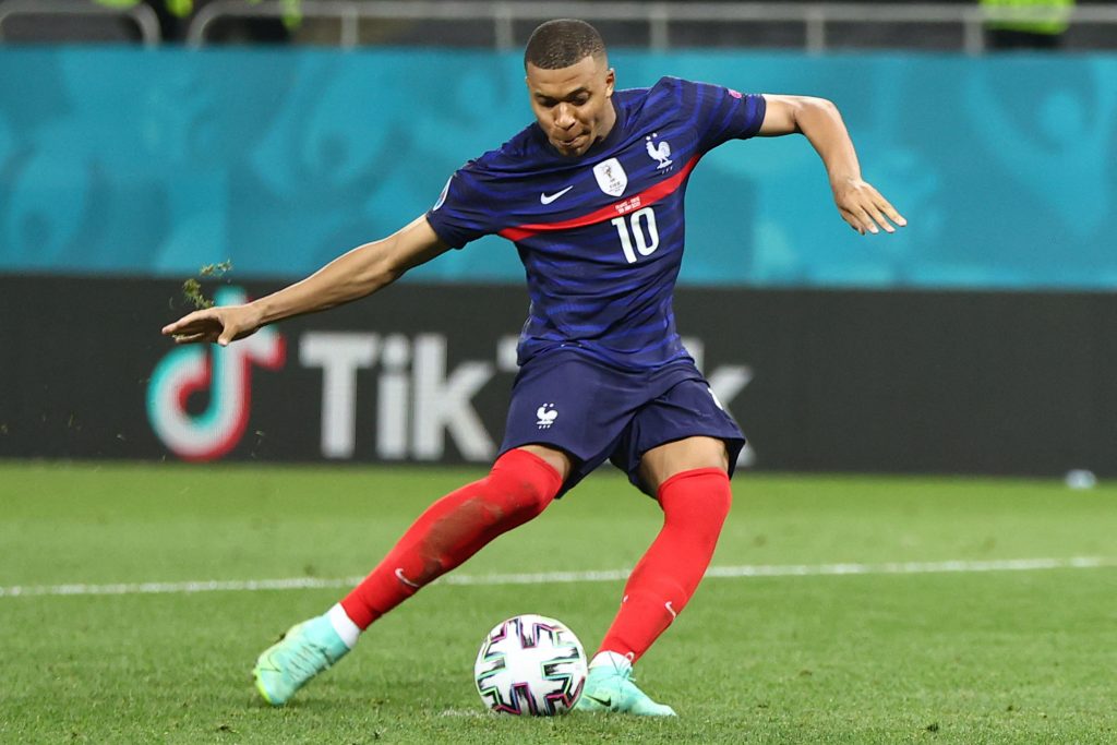 Kylian Mbappe in action for France. (Photo by MARKO DJURICA/POOL/AFP via Getty Images)