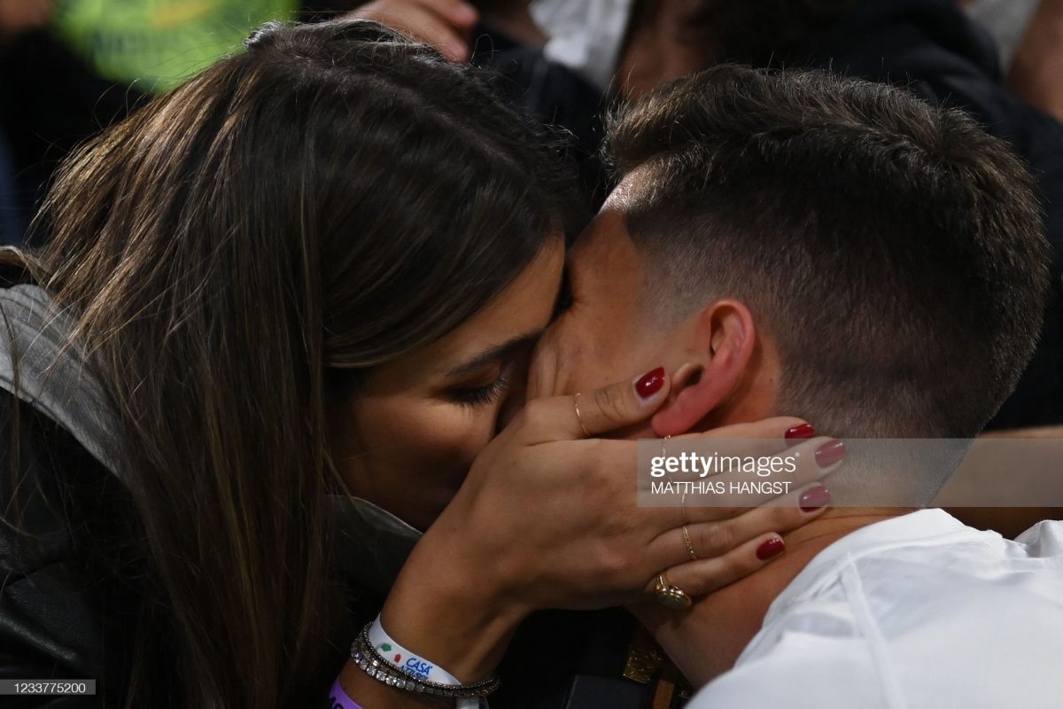 Italy's midfielder Matteo Pessina kisses his girlfriend Alessandra Navarra during the UEFA EURO 2020. (Photo by Matthias Hangst / POOL / AFP) (Photo by MATTHIAS HANGST/POOL/AFP via Getty Images)