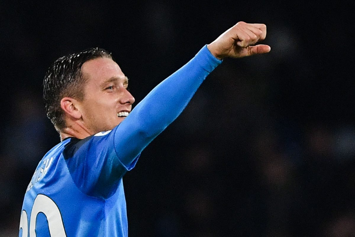 Piotr Zielinski celebrates after scoring his side's second goal during the Italian Serie A football match between Napoli and Empoli. (Photo by TIZIANA FABI/AFP via Getty Images)
