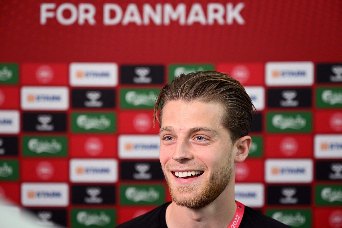 Denmark's midfielder Mathias Jensen in the press conference ahead of the 2022 FIFA World Cup. (Photo by NATALIA KOLESNIKOVA/AFP via Getty Images)