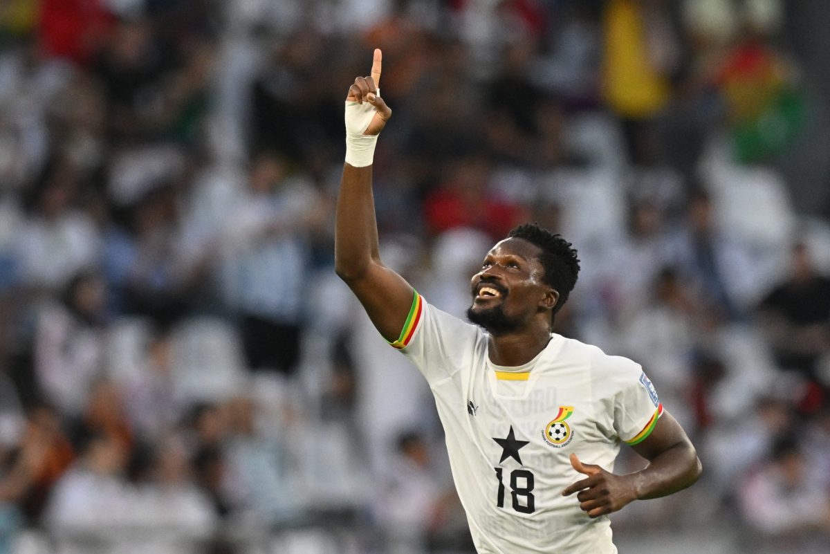 Daniel Amartey celebrates their second goal, scored by Ghana's midfielder Mohammed Kudus during the Qatar 2022 World Cup. (Photo by GLYN KIRK/AFP via Getty Images)