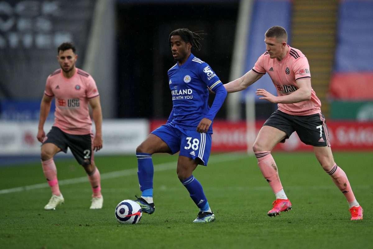 Leicester City's South African midfielder Thakgalo Leshabela vies for the ball against Sheffield United's English midfielder John Lundstram (R) during the English Premier League football match between Leicester City and Sheffield United at King Power Stadium in Leicester, central England on March 14, 2021. (Photo by MOLLY DARLINGTON/POOL/AFP via Getty Images)