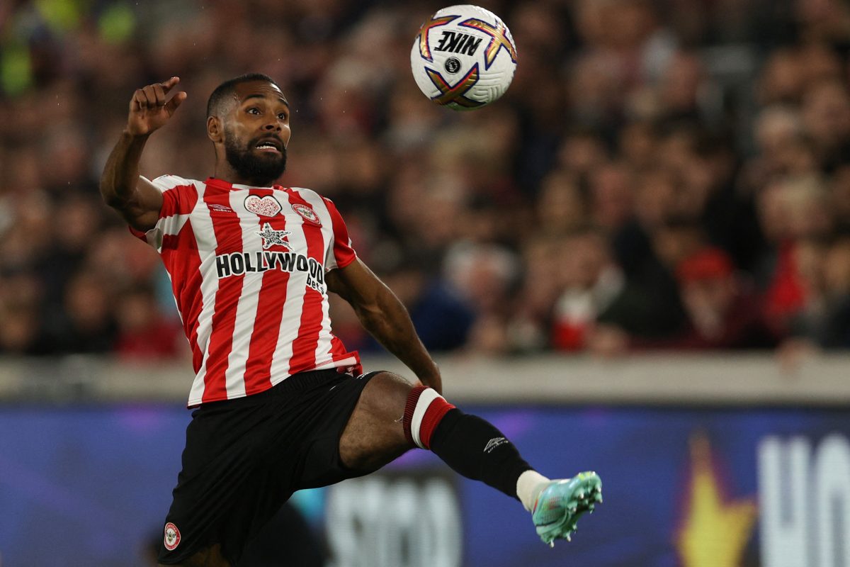 Brentford's English defender Rico Henry controls the ball during the English Premier League football match between Brentford and Chelsea. (Photo by ADRIAN DENNIS/AFP via Getty Images)
