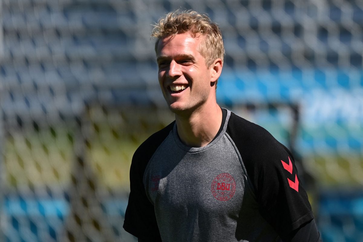 Denmark's goalkeeper Jonas Lossl is married to Camilla. (Photo by JONATHAN NACKSTRAND/AFP via Getty Images)