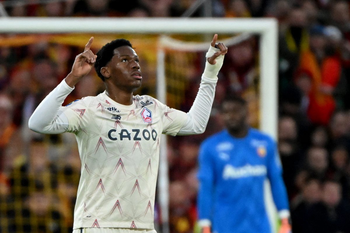 Lille's Canadian forward Jonathan David celebrates after scoring a goal during the French L1 football match between Lens and Lille. (Photo by FRANCOIS LO PRESTI/AFP via Getty Images)