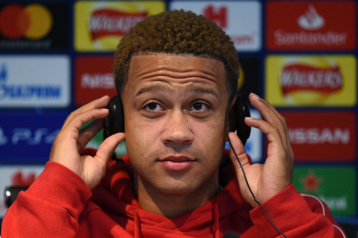 Memphis Depay has a net worth of £16.5million. (Photo by OLI SCARFF/AFP via Getty Images)