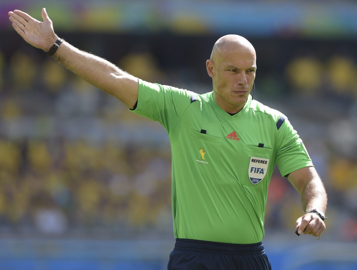 Howard Melton Webb gestures during the Round of 16 football match between Brazil and Chile. (Photo credit should read JUAN MABROMATA/AFP via Getty Images)