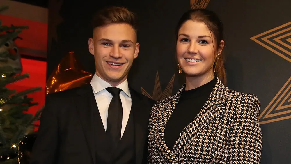 Joshua Kimmich of FC Bayern Muenchen attends with his wife Lina Meyer the club's Christmas party at Allianz Arena. (Credits: Prisma)