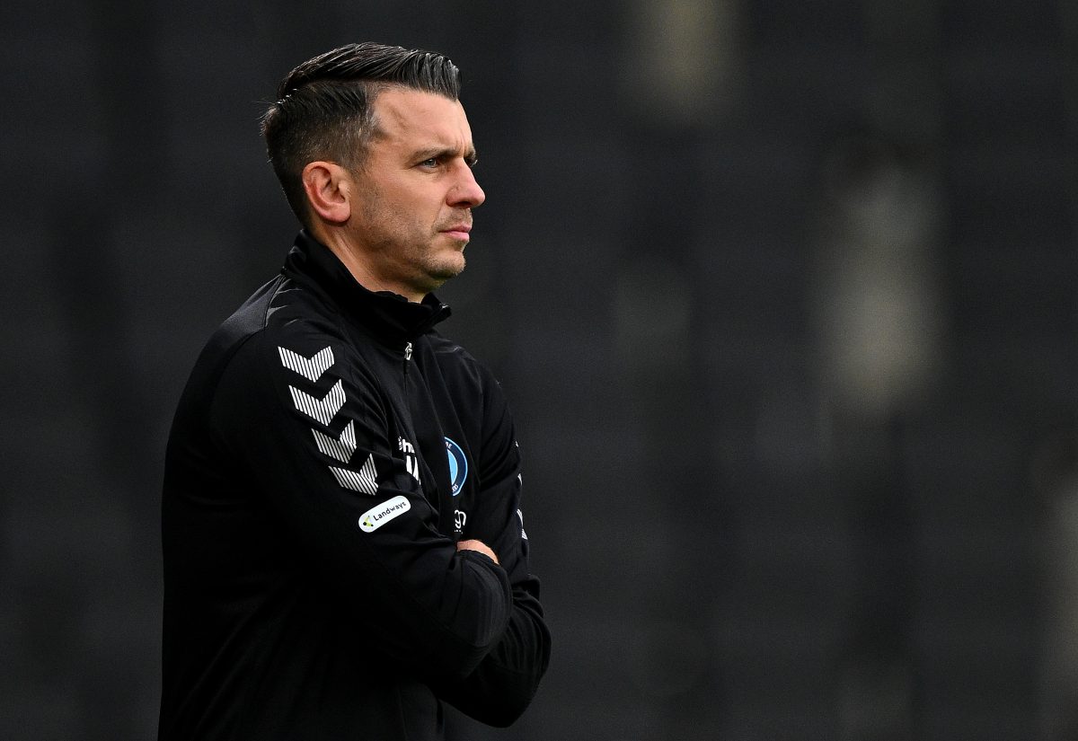 Matt Bloomfield, manager of Wycombe Wanderers on the touchline. (Photo by Clive Mason/Getty Images)
