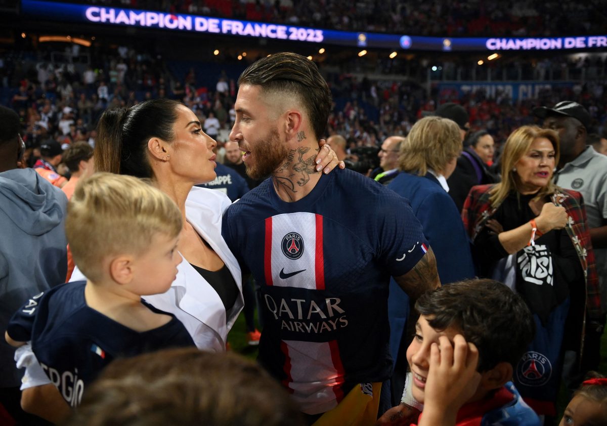 Sergio Ramos embraces his wife Pilar Rubio during the 2022-2023 Ligue 1 championship trophy ceremony following the L1 football match between Paris Saint-Germain (PSG) and Clermont Foot 63. (Photo by FRANCK FIFE/POOL/AFP via Getty Images)